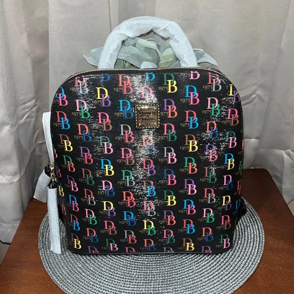 Dooney & bourke deals patent leather pod backpack